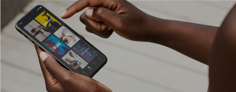 Person using Equinox app on a smartphone